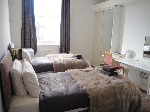 Imagen de la habitación del Hotel Carlton House. Foto 19