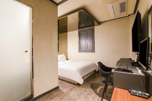 Imagen de la habitación del Hotel Carlton, Incheon . Foto 15