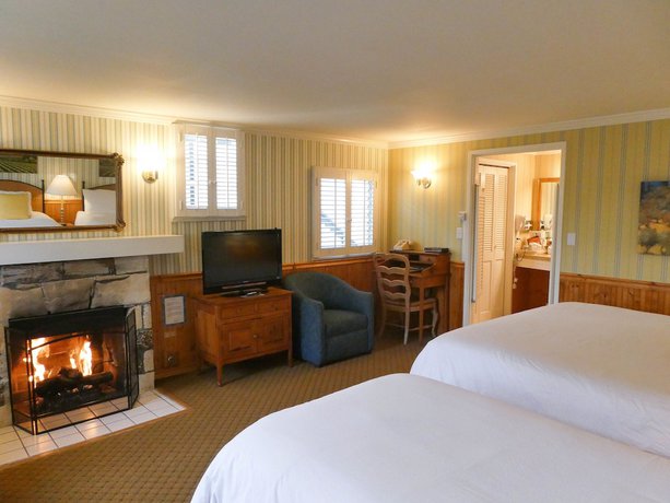 Imagen de la habitación del Hotel Carmel Fireplace Inn. Foto 11