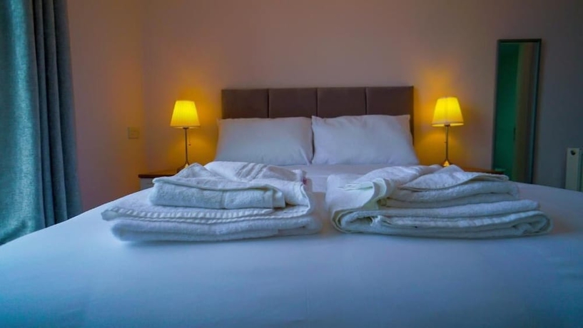 Imagen de la habitación del Hotel Carmel House. Foto 8