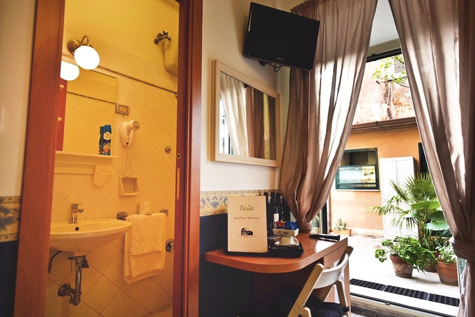 Imagen de la habitación del Hotel Carmel Roma. Foto 4