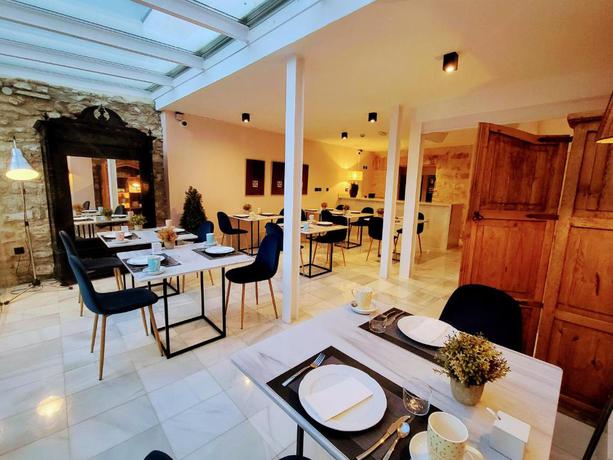 Imagen del bar/restaurante del Hotel Carmen Boutique. Foto 2