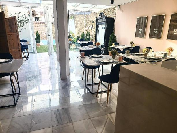 Imagen del bar/restaurante del Hotel Carmen Boutique. Foto 3