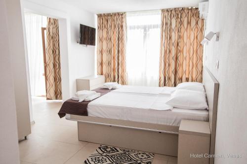 Imagen de la habitación del Hotel Carmen, VENUS - SATURN. Foto 8