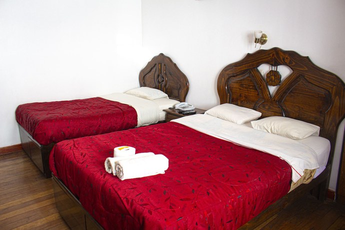 Imagen de la habitación del Hotel Carmens Home. Foto 6