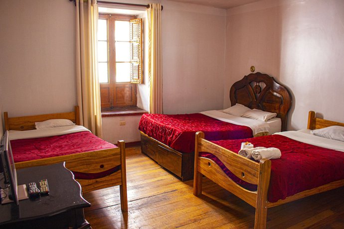 Imagen de la habitación del Hotel Carmens Home. Foto 7