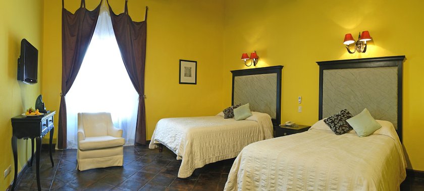 Imagen de la habitación del Hotel Carmina. Foto 16