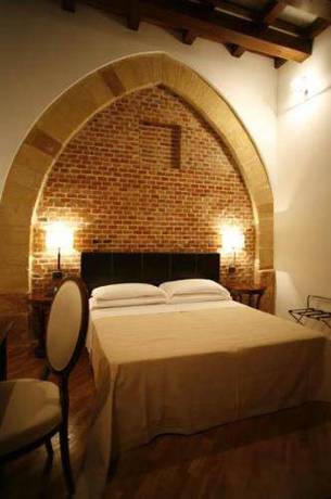 Imagen de la habitación del Hotel Carmine. Foto 11