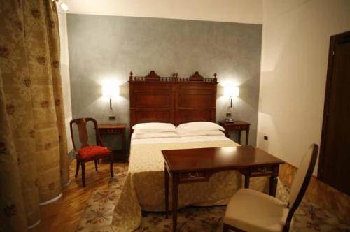 Imagen de la habitación del Hotel Carmine. Foto 12