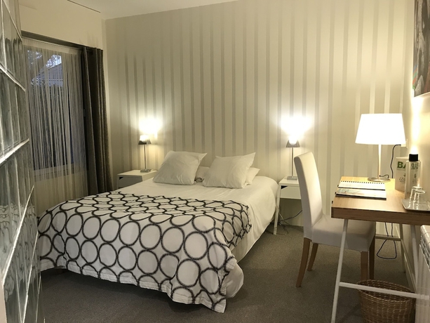 Imagen de la habitación del Hotel Carnac Lodge and Spa. Foto 3