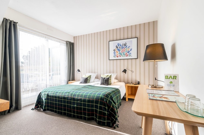 Imagen de la habitación del Hotel Carnac Lodge and Spa. Foto 17
