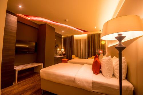 Imagen de la habitación del Hotel Carnelian Muscat - Airport. Foto 19