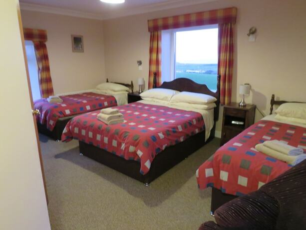 Imagen de la habitación del Hotel Carnside Guest House. Foto 16