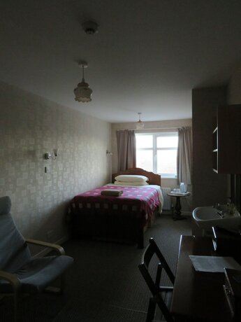 Imagen de la habitación del Hotel Carnside Guest House. Foto 19