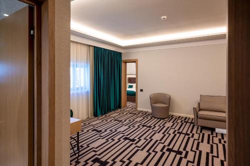 Imagen de la habitación del Hotel Carolin, Caciulata. Foto 17