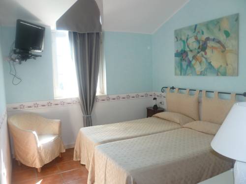 Imagen de la habitación del Hotel Caroline, Brusimpiano. Foto 15