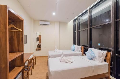 Imagen de la habitación del Hotel Caroline Guest House. Foto 7