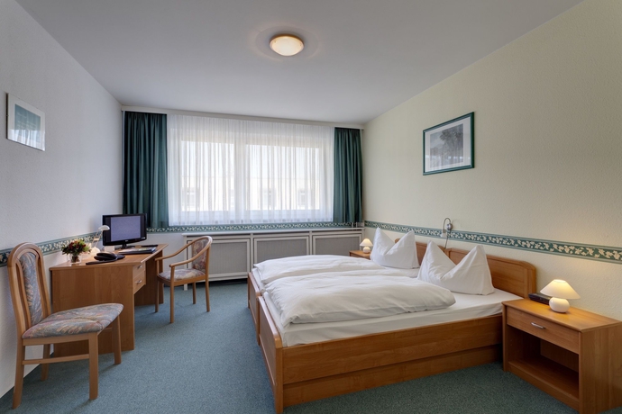 Imagen de la habitación del Hotel Carolinenhof Hotel. Foto 10