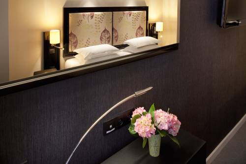 Imagen de la habitación del Hotel Caron Le Marais. Foto 11