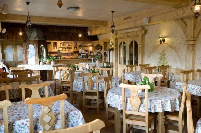 Imagen del bar/restaurante del Hotel Carpatia Bieszczadzki Gościniec. Foto 12