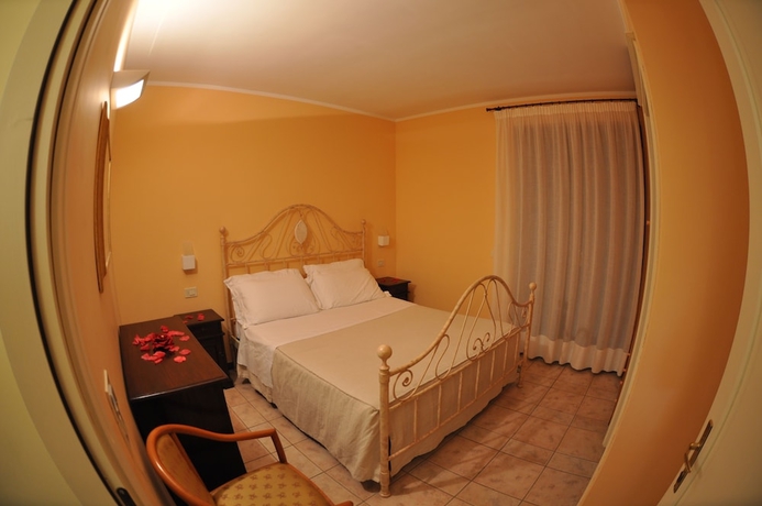 Imagen de la habitación del Hotel Carpediem Assisi Living Club. Foto 5