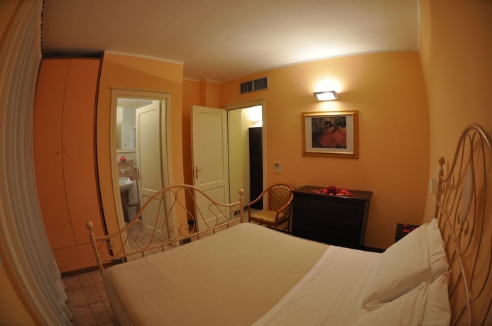 Imagen de la habitación del Hotel Carpediem Assisi Living Club. Foto 7
