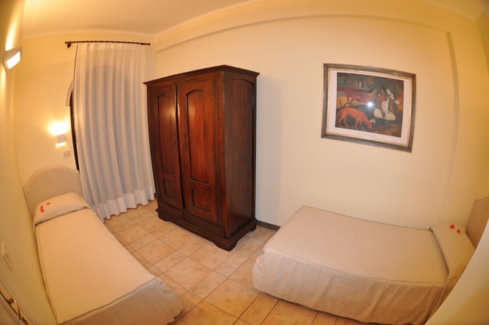 Imagen de la habitación del Hotel Carpediem Assisi Living Club. Foto 8