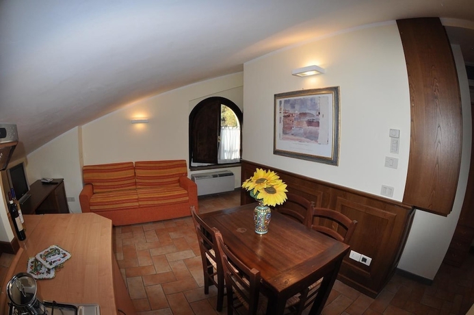 Imagen de la habitación del Hotel Carpediem Assisi Living Club. Foto 15