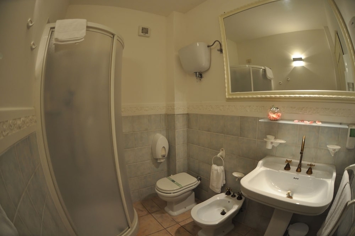 Imagen de la habitación del Hotel Carpediem Assisi Living Club. Foto 16