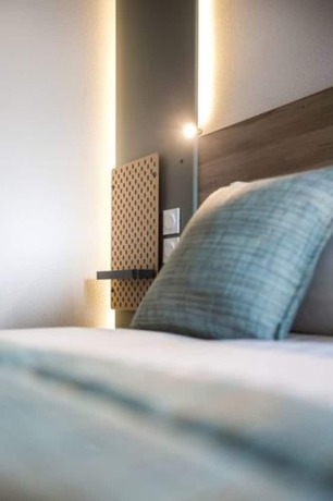 Imagen de la habitación del Hotel Carré Pau Airport Hôtel. Foto 10