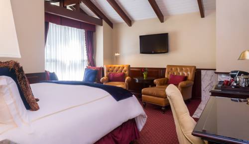 Imagen de la habitación del Hotel Carriage House Inn. Foto 8