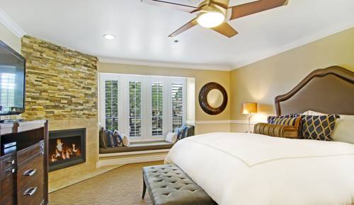 Imagen de la habitación del Hotel Carriage House Inn. Foto 11