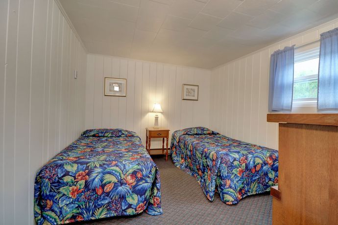 Imagen de la habitación del Hotel Carriage House Motel Cottages and Suites. Foto 14