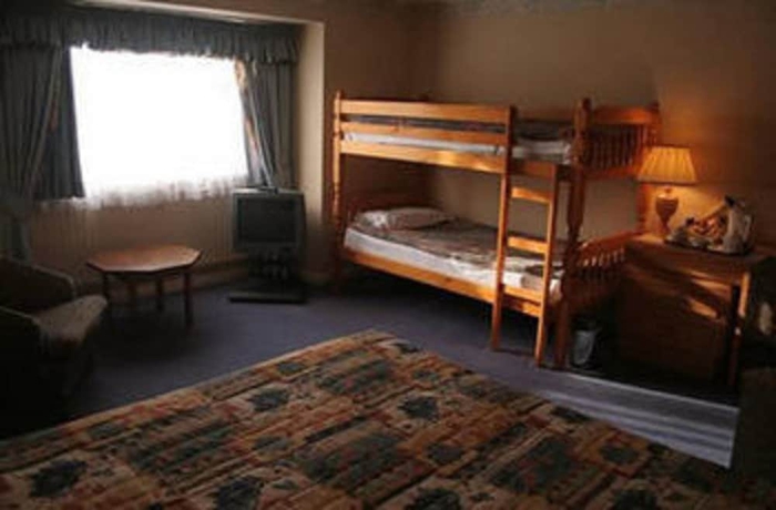 Imagen de la habitación del Hotel Carrington House. Foto 4