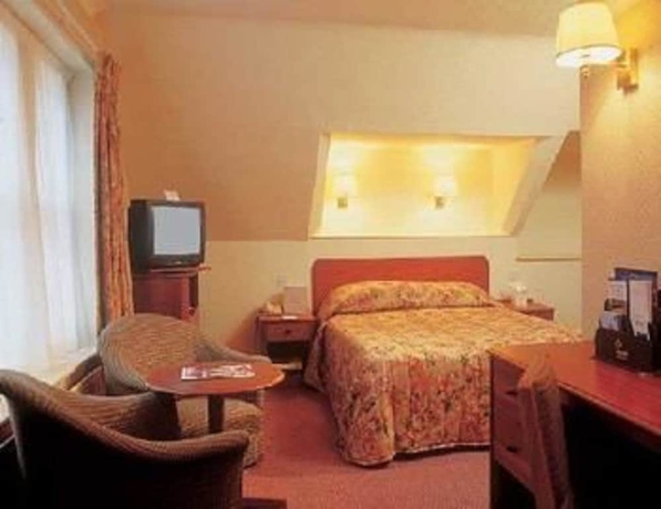 Imagen de la habitación del Hotel Carrington House. Foto 11