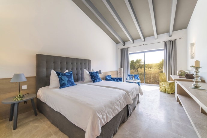 Imagen de la habitación del Hotel Carrossa Spa Villas. Foto 4