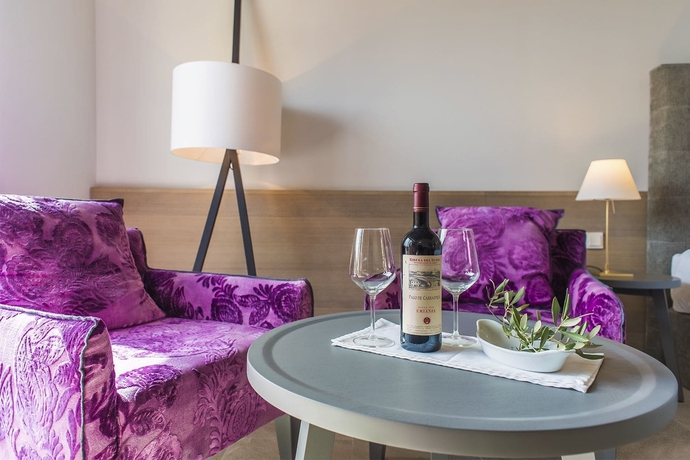 Imagen de la habitación del Hotel Carrossa Spa Villas. Foto 10