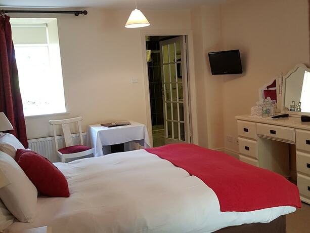 Imagen de la habitación del Hotel Carrygerry Country House. Foto 10