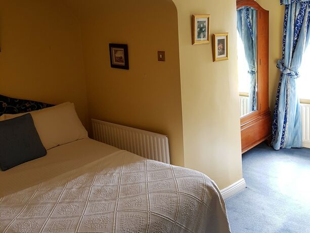 Imagen de la habitación del Hotel Carrygerry Country House. Foto 16