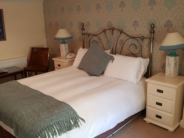 Imagen de la habitación del Hotel Carrygerry Country House. Foto 17