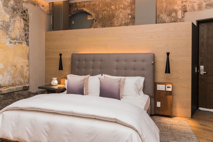 Imagen de la habitación del Hotel Cartesiano Boutique and Wellness. Foto 12