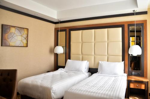 Imagen de la habitación del Hotel Cartoon Razgrad. Foto 19