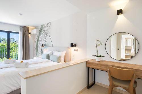 Imagen de la habitación del Hotel Carvoeiro Gardens. Foto 5