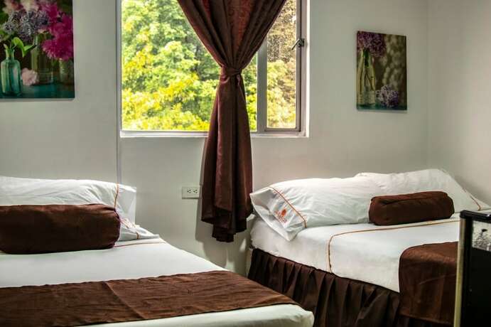 Imagen de la habitación del Hotel Casa 10 Medellin. Foto 18