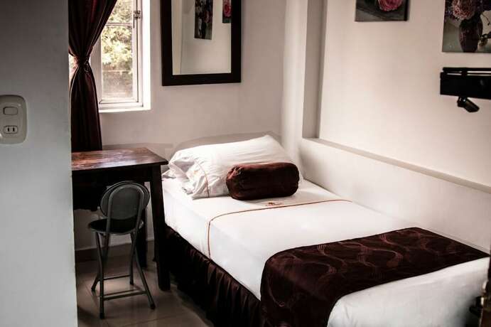 Imagen de la habitación del Hotel Casa 10 Medellin. Foto 19