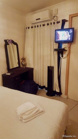 Imagen de la habitación del Hotel Casa Amapola Manila. Foto 10