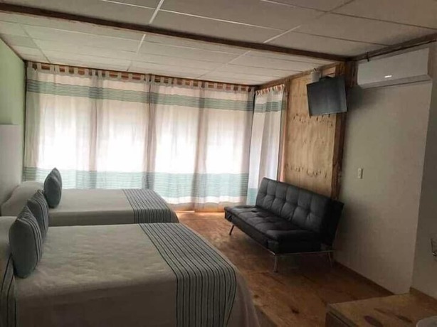 Imagen de la habitación del Hotel Casa Amelia Huatulco. Foto 7