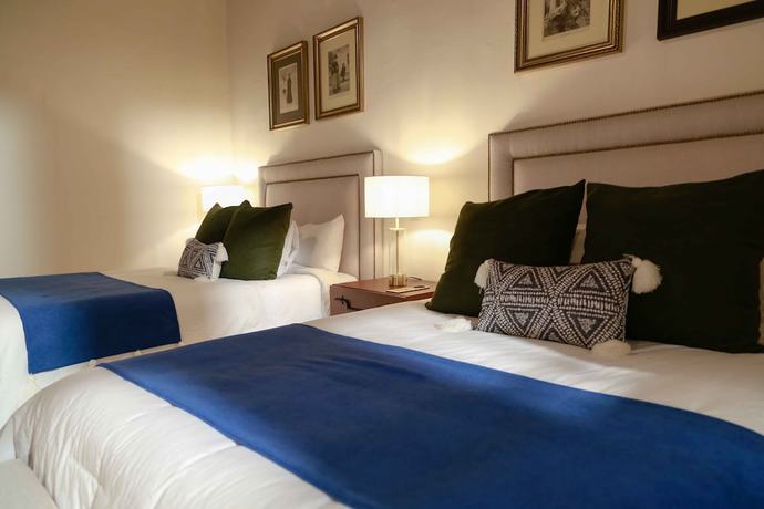 Imagen de la habitación del Hotel Casa Angeles. Foto 4