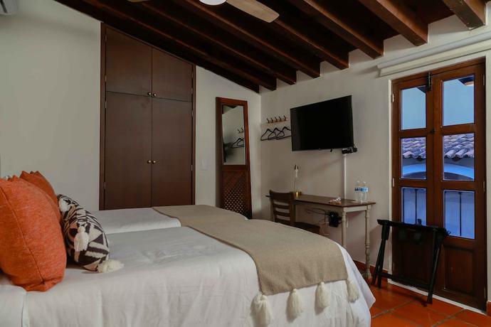 Imagen de la habitación del Hotel Casa Angeles. Foto 7