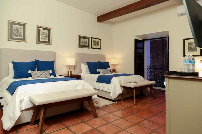 Imagen de la habitación del Hotel Casa Angeles. Foto 10
